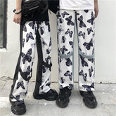 Übergroße Denimhose mit Schmetterlingsmuster